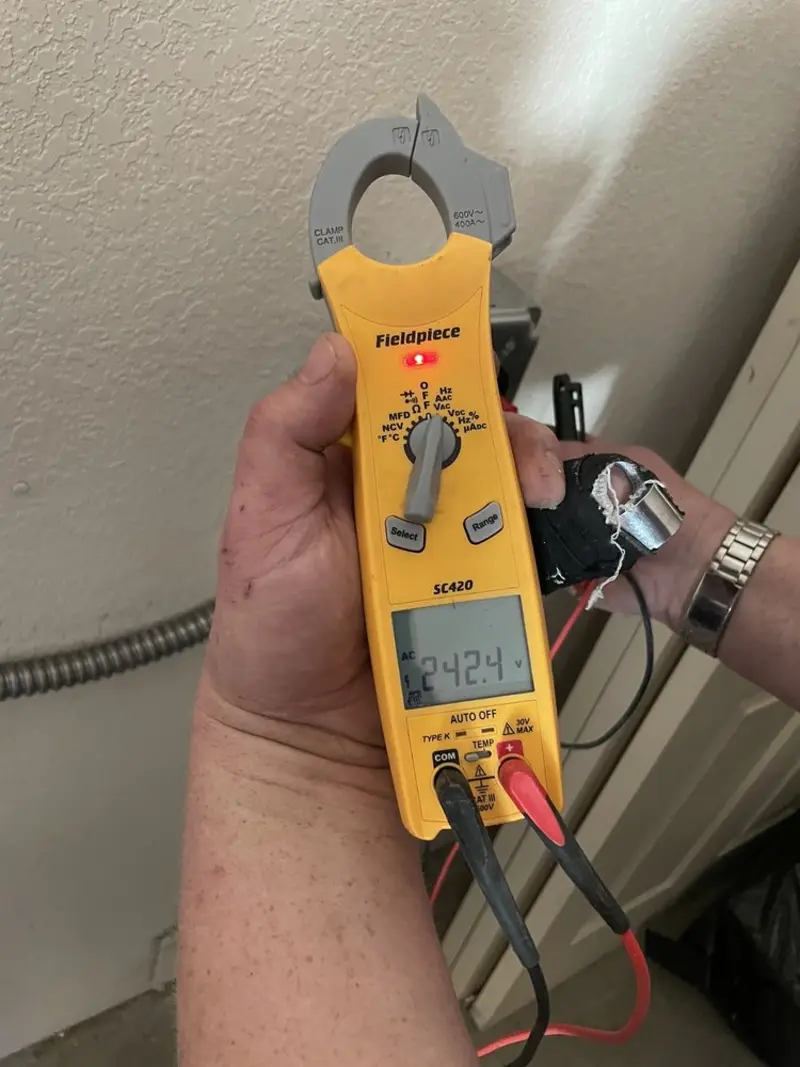 Voltage testing with clamp meter during Generator Installation in Pevely